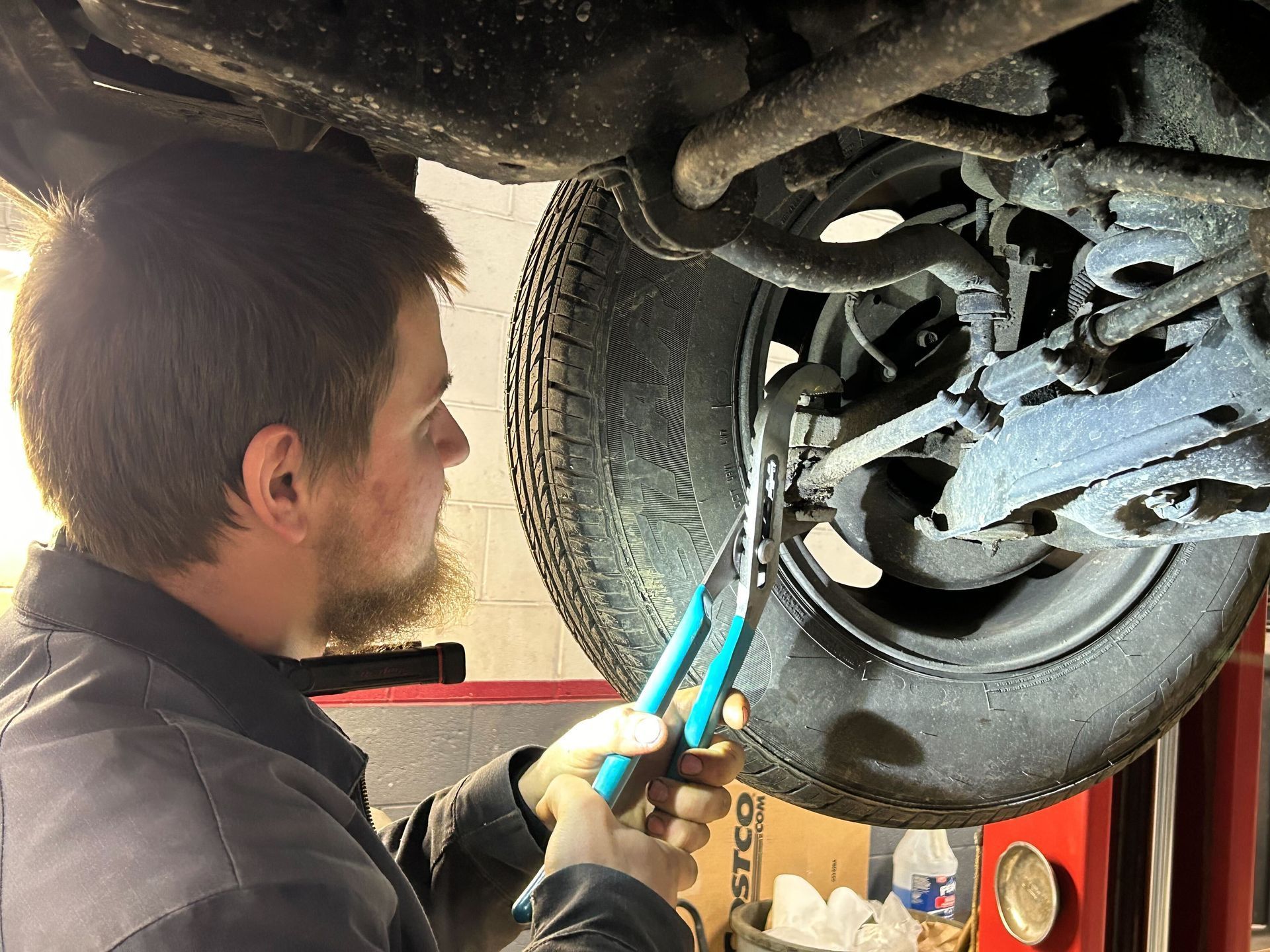 Auto DR's foreman working on a car from a Casco resident. 