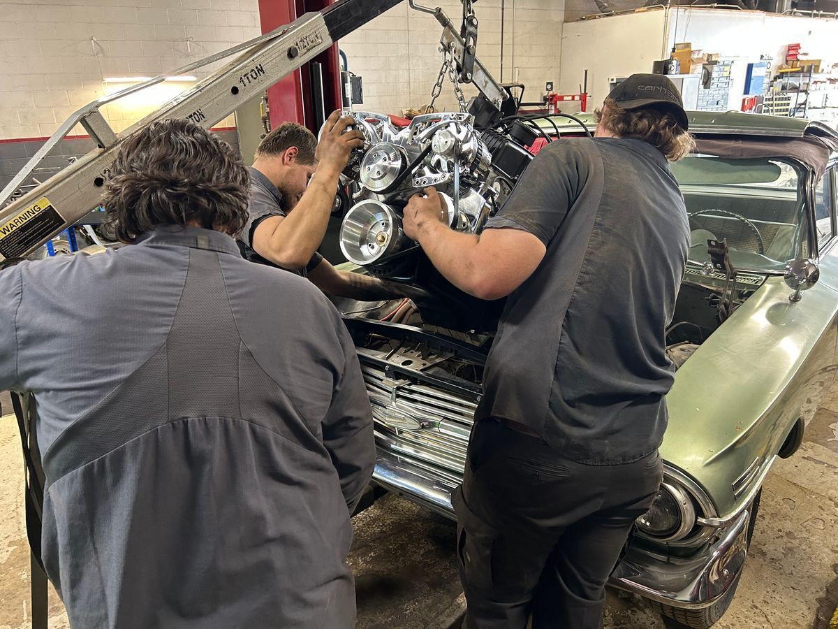 ASE certified mechanics replacing an engine on a New Baltimore customer's vehicle.
