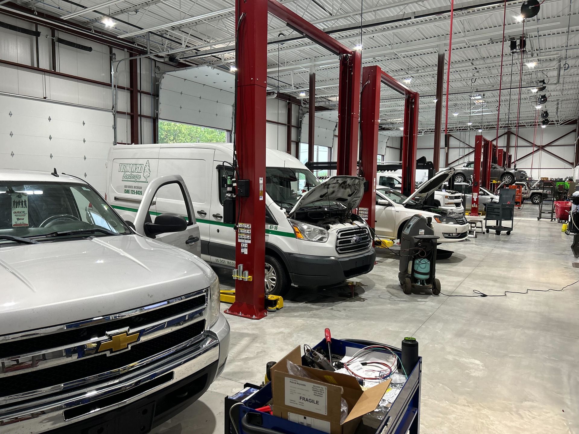 The inside of Auto DR's repair shop. There are five cars in the shop, all from Mount Clemens residents. 
