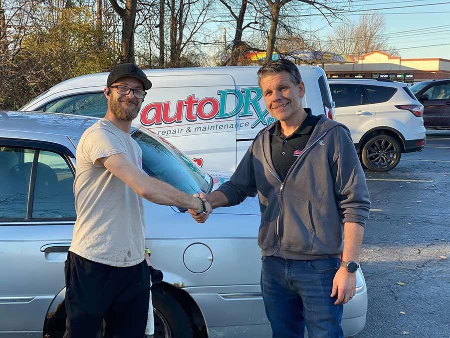  A local Macomb County resident receiving free auto services from Auto DR.