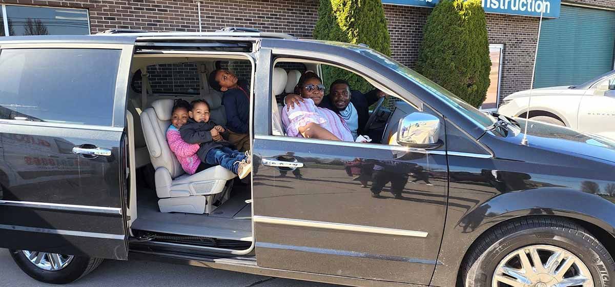  A local Macomb County family receiving free auto services from Auto DR.