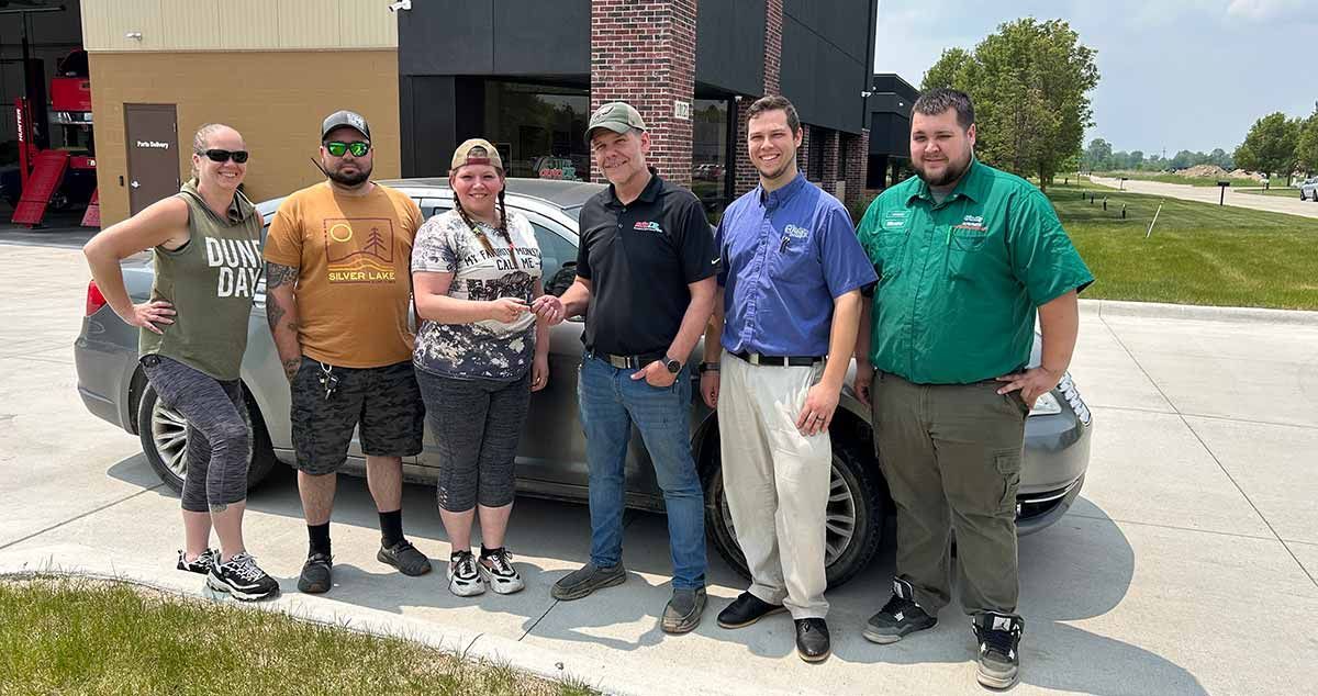  A local St. Clair County family receiving free auto services from Auto DR.