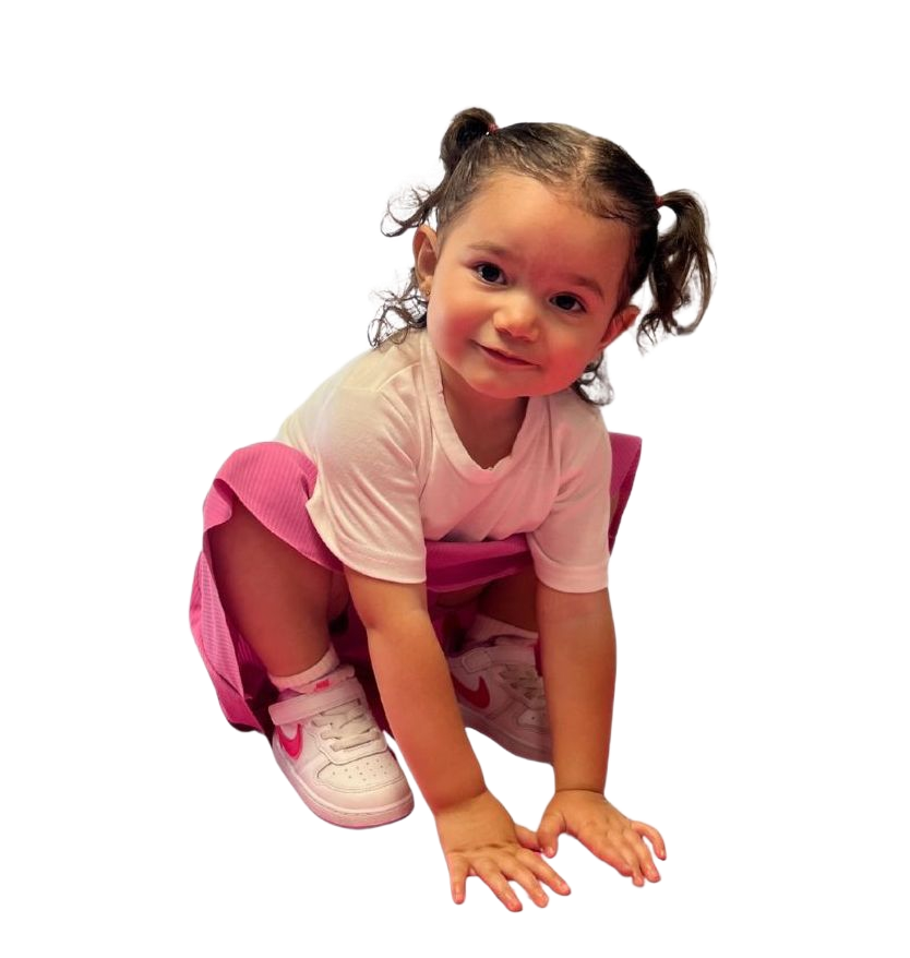 a young athlete is sitting and stretching