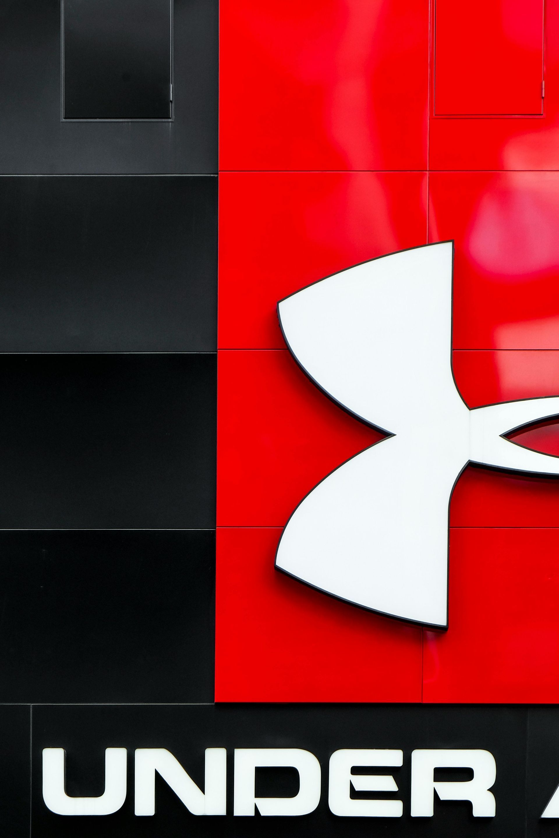 Under Armour logo: White logo on a red background, with