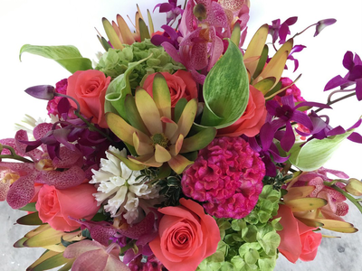 A close up of a bouquet of flowers on a table
