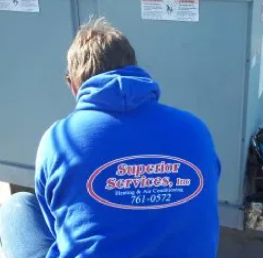 Man Wearing Blue Jacket — Jefferson City, MO — Superior Services Inc.