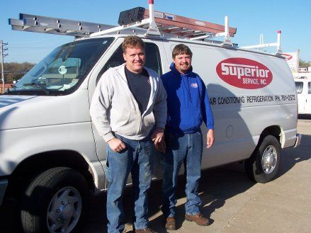 Men with Truck on the Background — Jefferson City, MO — Superior Services Inc.