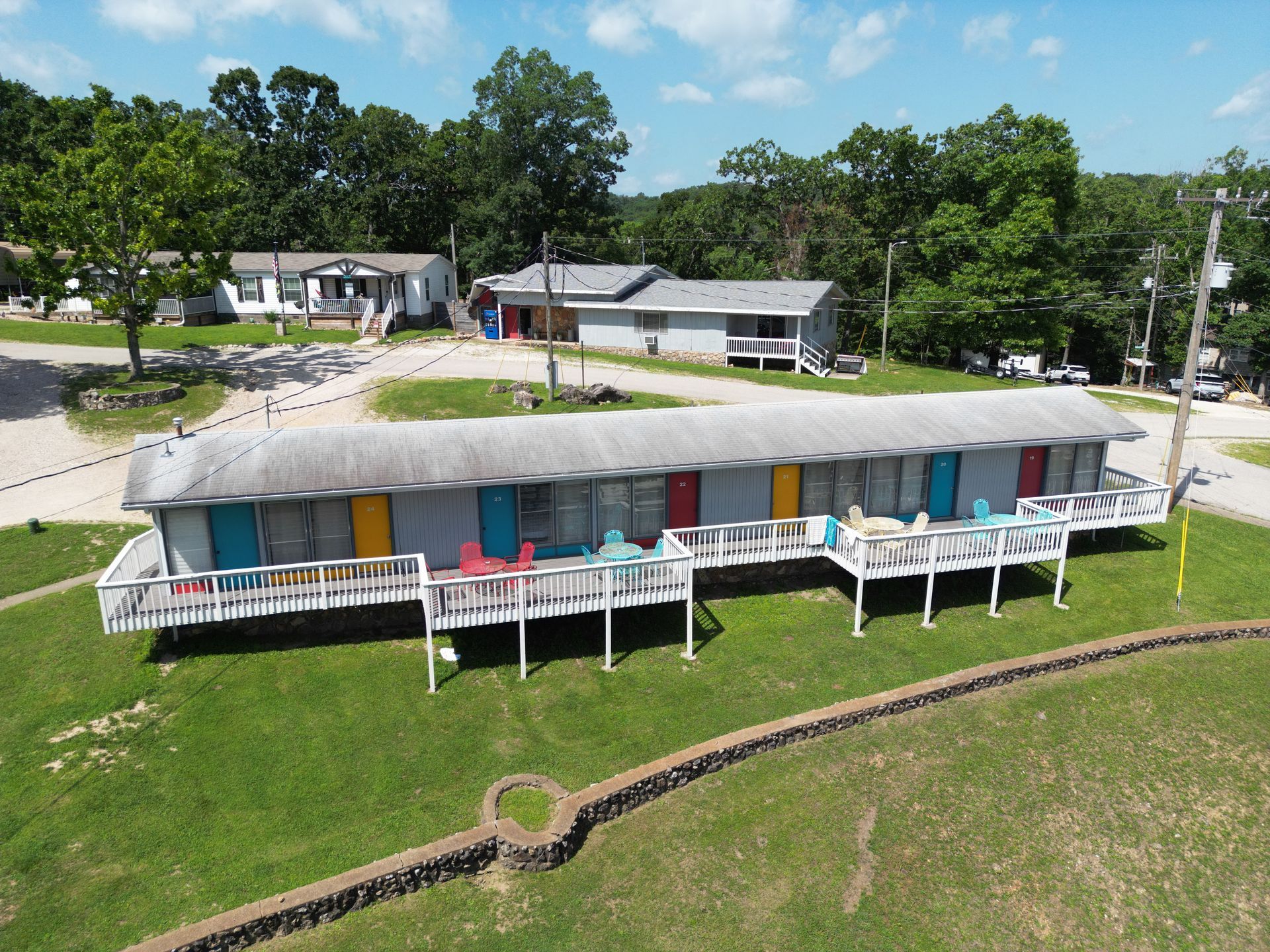 An aerial view of a motel with a lot of balconies.