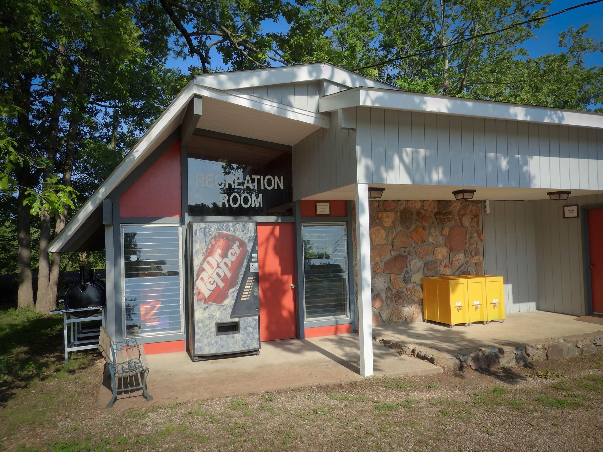 A building with a vending machine that says salvation army on it