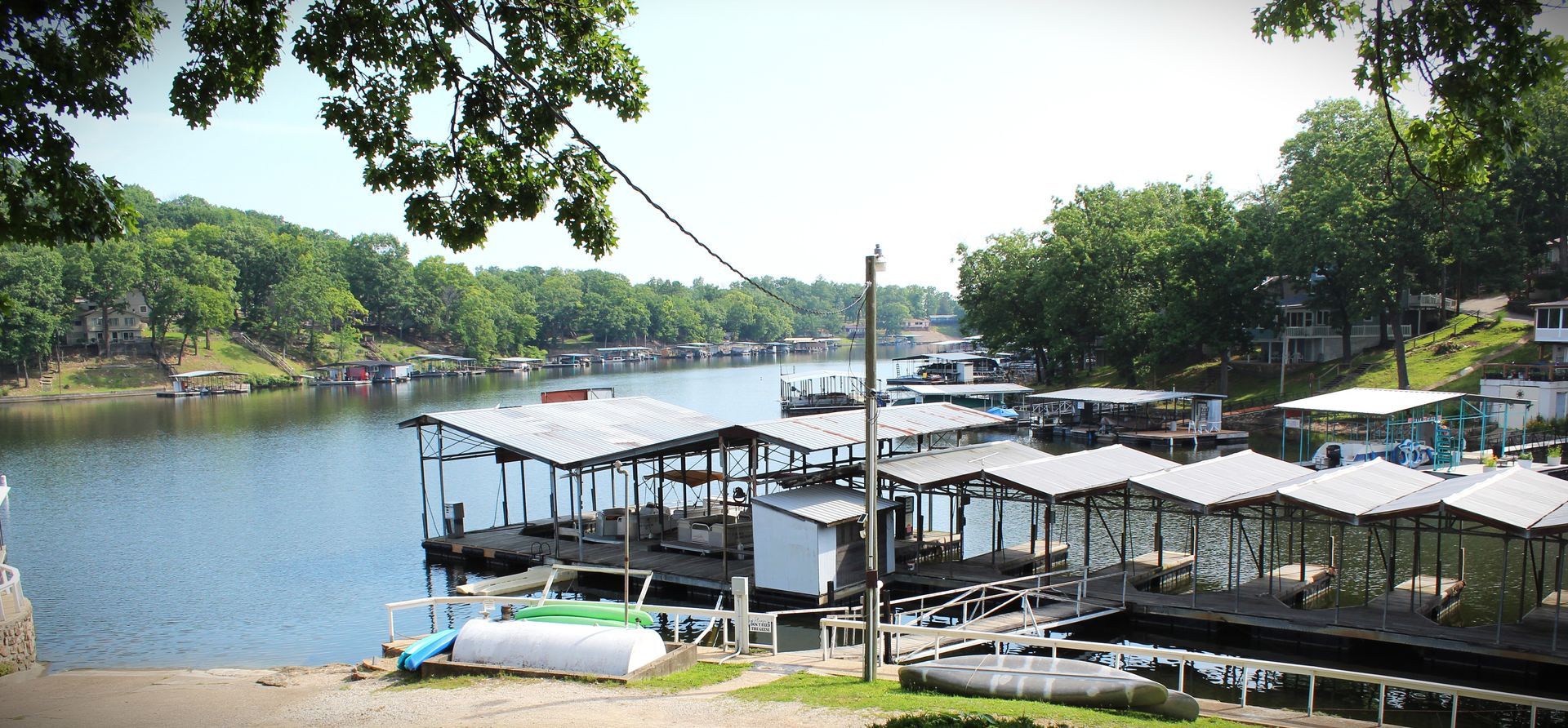 A lake with a lot of boats docked in it