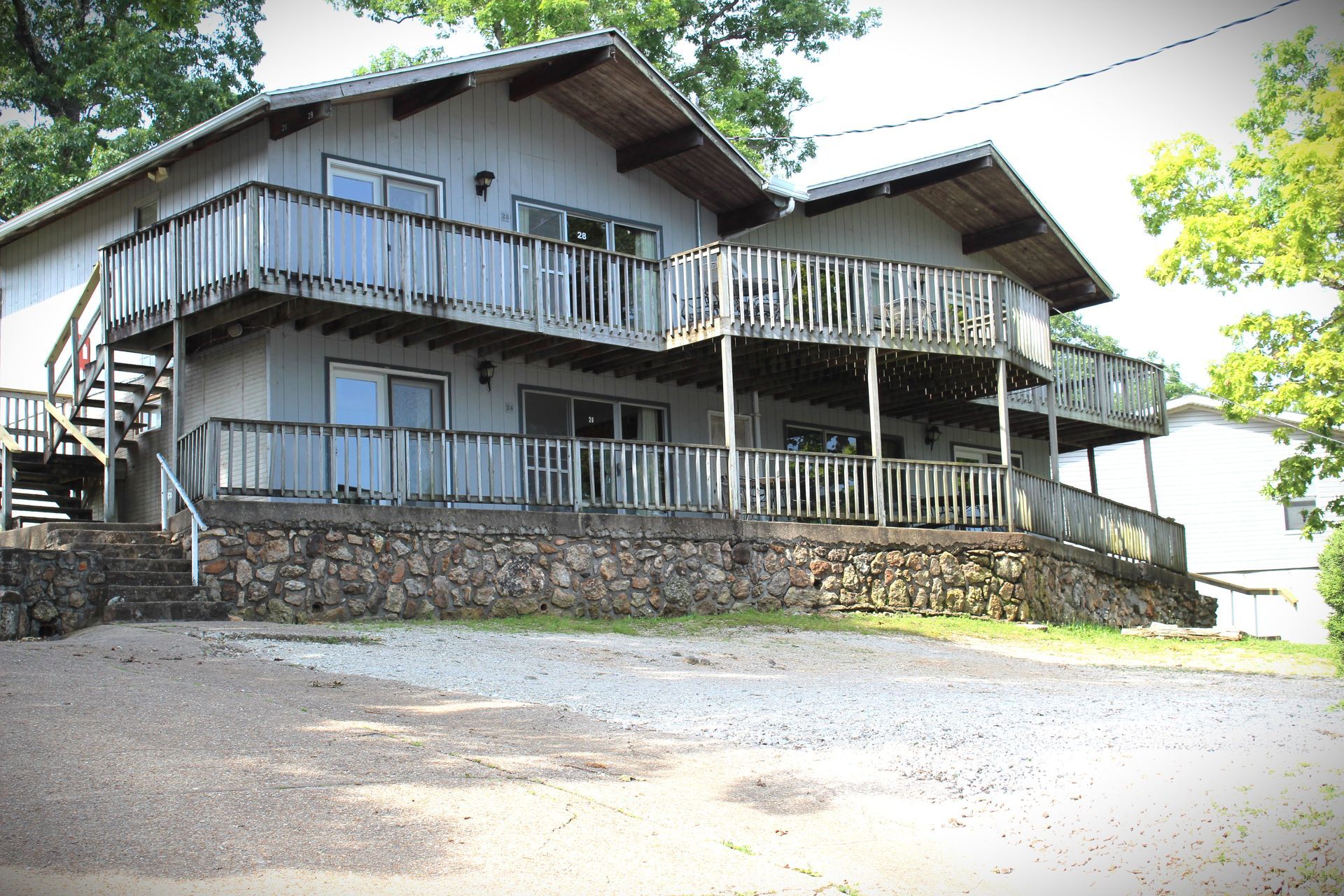 A large house with a lot of balconies and stairs