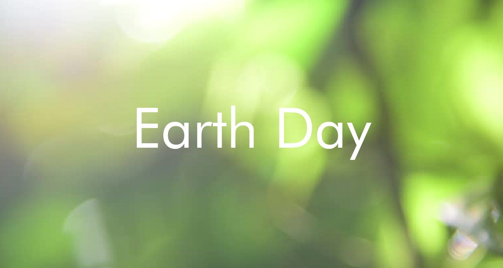 The word earth day is on a green background.