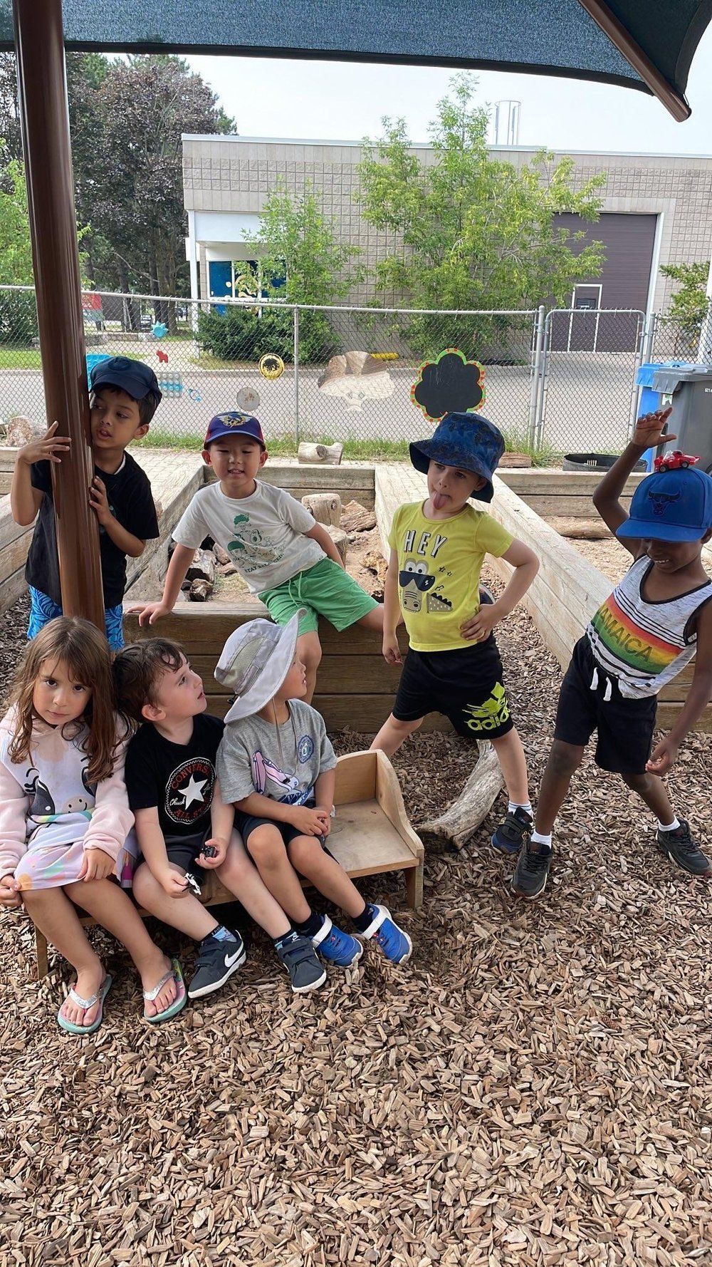 A group of children are playing on a playground.