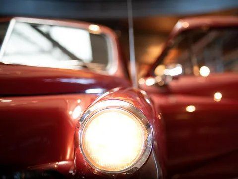 A Close Up of a Red Car 's Headlight — CS Mechanical in Gormans Hill, NSW