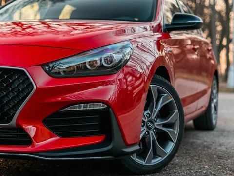 A Red Car is Parked on the Side of the Road — CS Mechanical in Gormans Hill, NSW