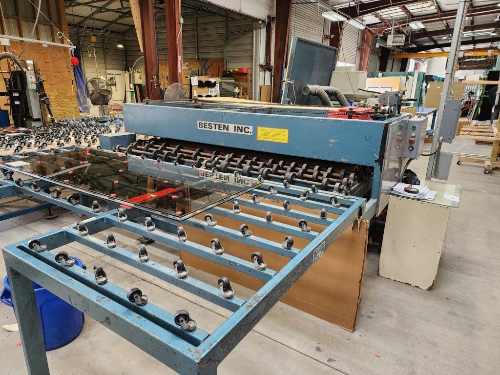 A Machine Is Sitting on Top of A Table in A Warehouse - Buford, GA - EGM Tempering