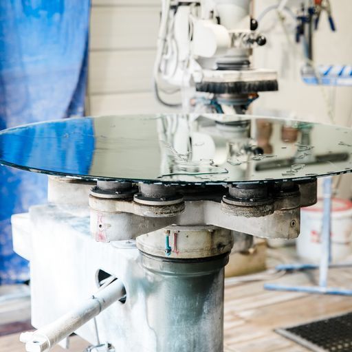 A Round Table with A Mirror on Top of It - Buford, GA - EGM Tempering