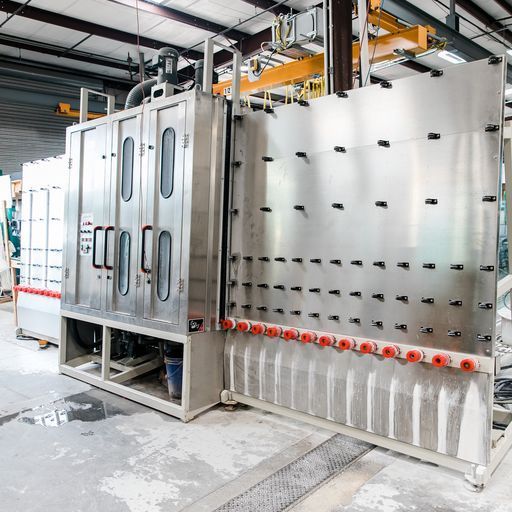 A Large Stainless Steel Machine Is Sitting in A Factory - Buford, GA - EGM Tempering