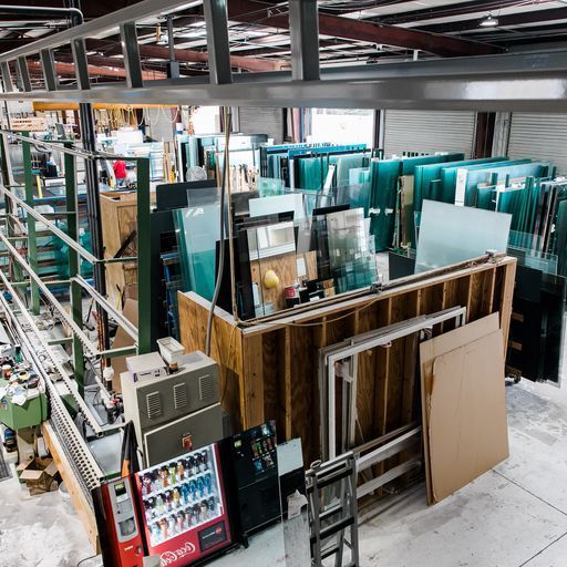 A Coca Cola Vending Machine Sits in A Warehouse - Buford, GA - EGM Tempering