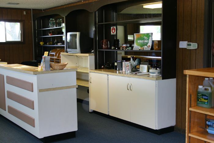 A counter in a room with a sign that says tv on it