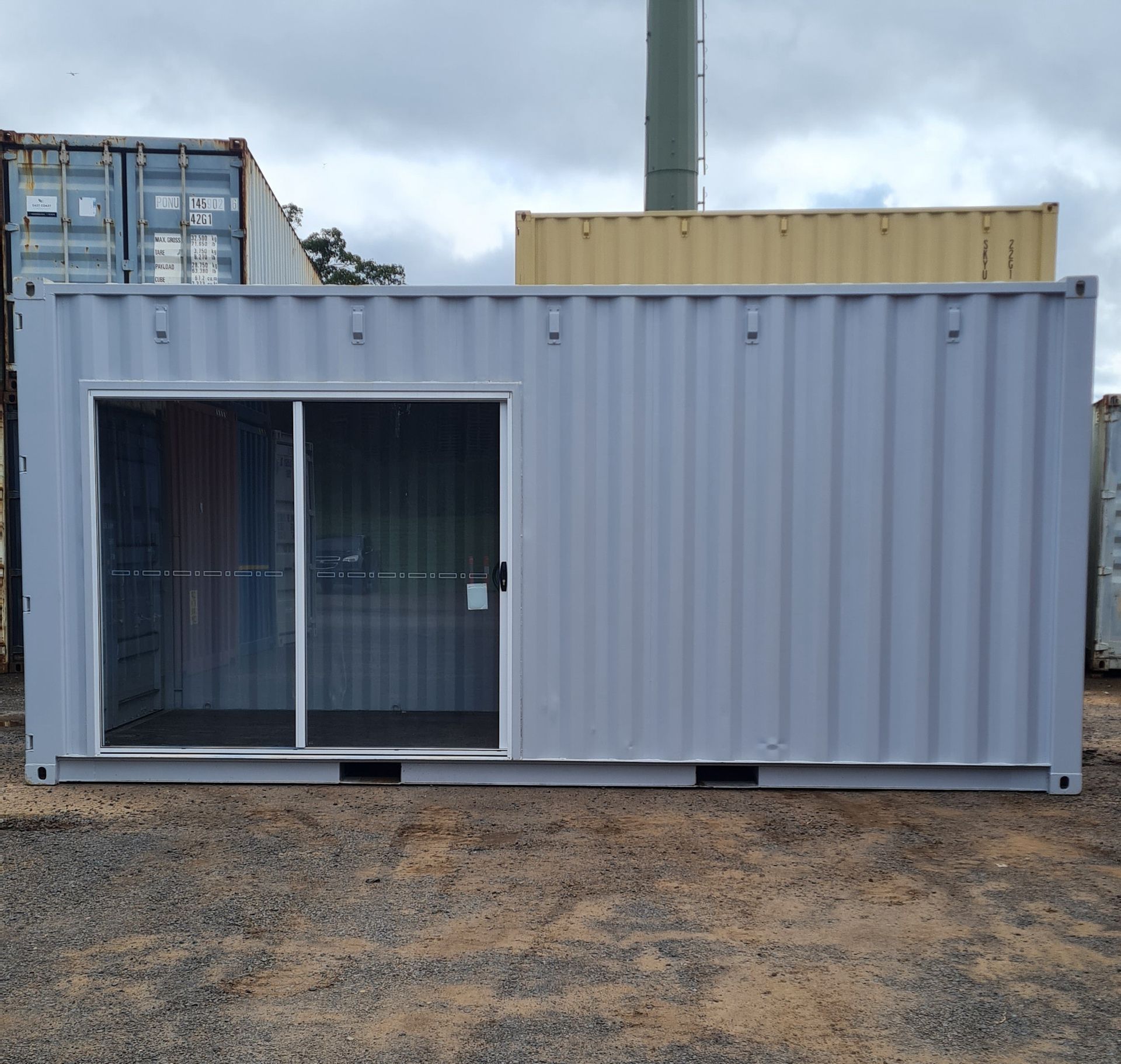 Horizontal Grey Shipping Container With Closed Door —  Sunshine Coast Queensland