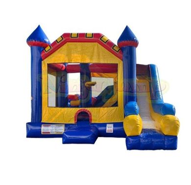 A colorful inflatable bounce house with a slide, featuring blue, yellow, and red castle-themed design.