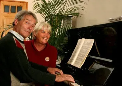 Adult learning how to play the piano