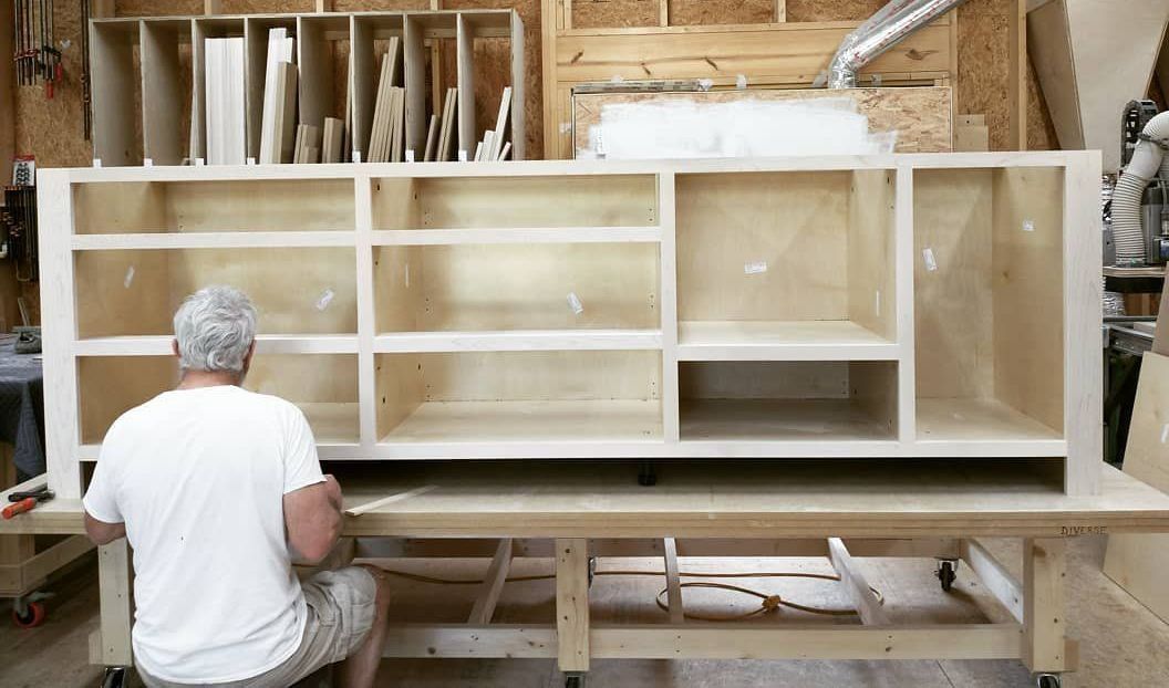 Custom building of base solid wood cabinets.