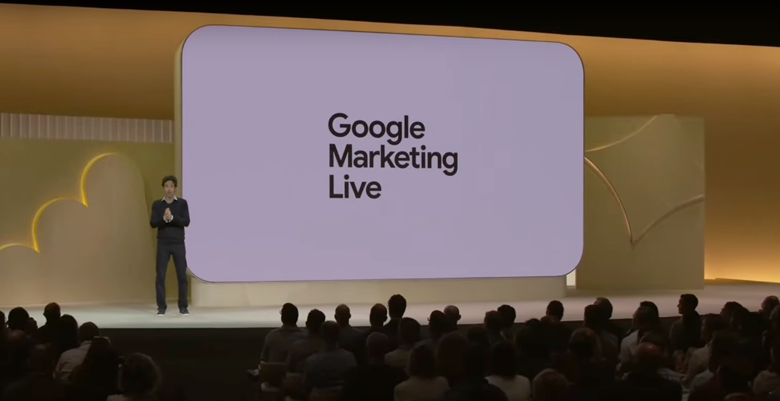 A man is giving a presentation at google marketing live
