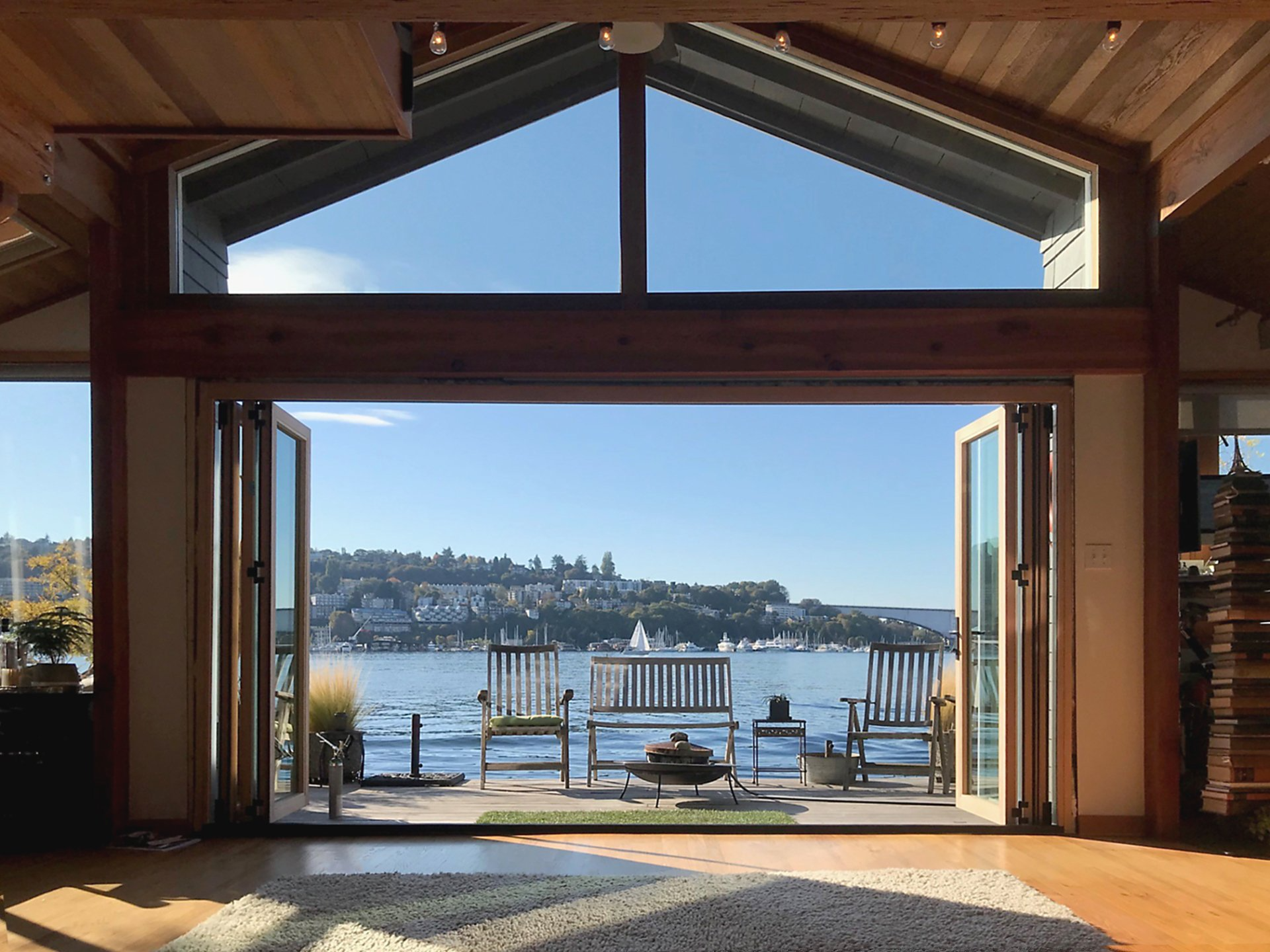 Folding door on house boat with view of Lake Washington