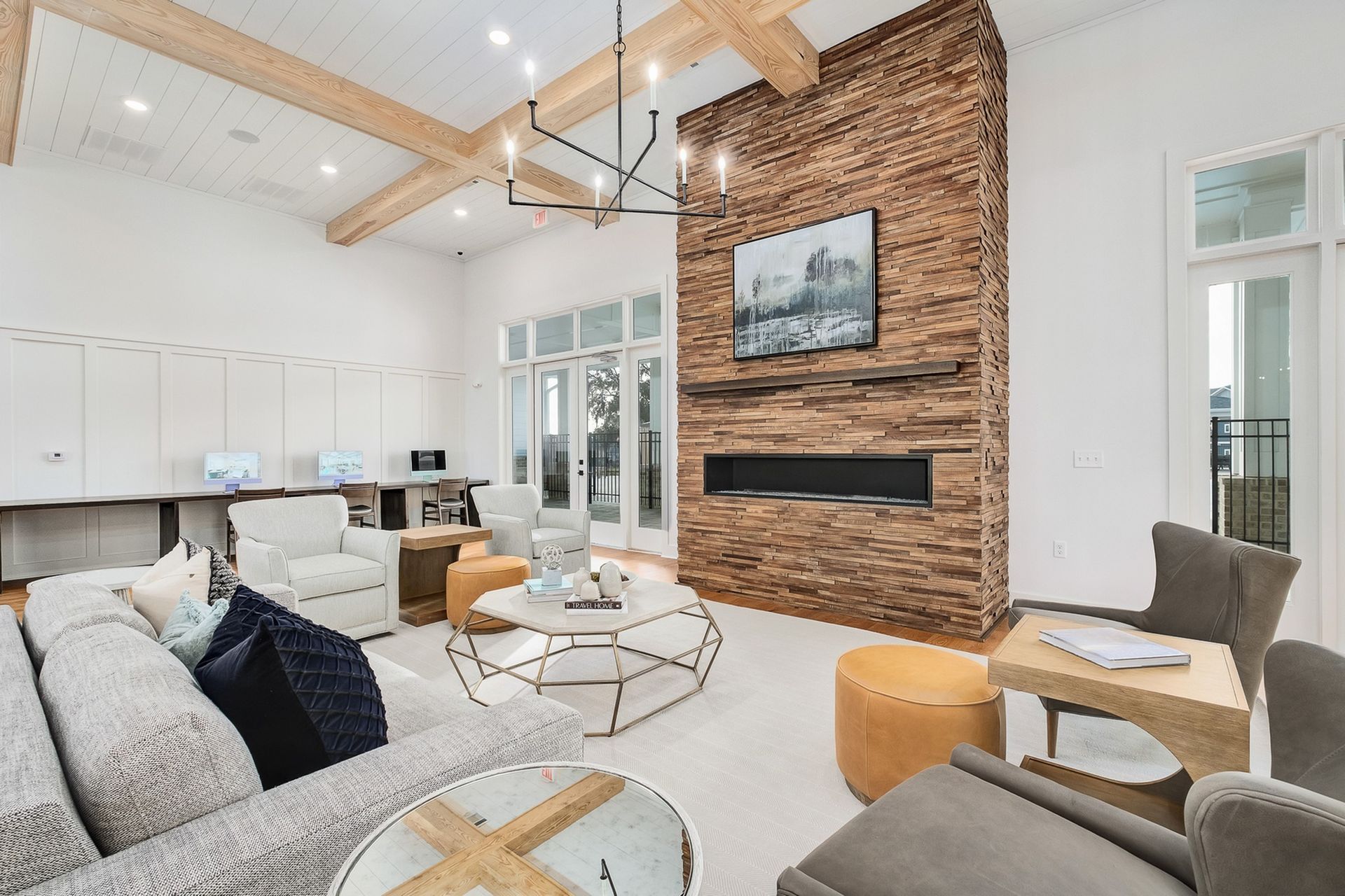 A resident lounge filled with furniture and a fireplace.
