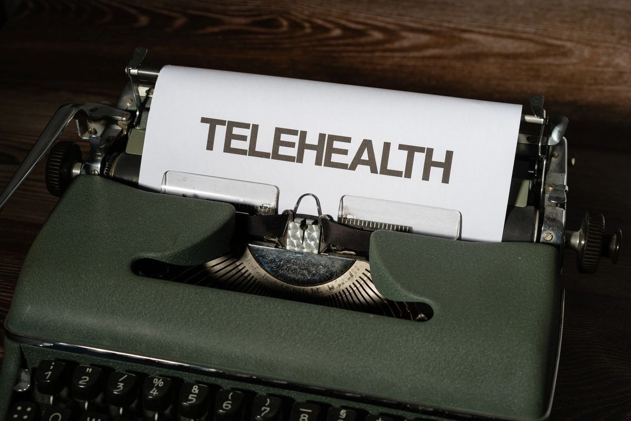 A Typewriter With A Piece Of Paper That Says Telehealth On It — Phoenix Mandorla In Rockhampton City, QLD