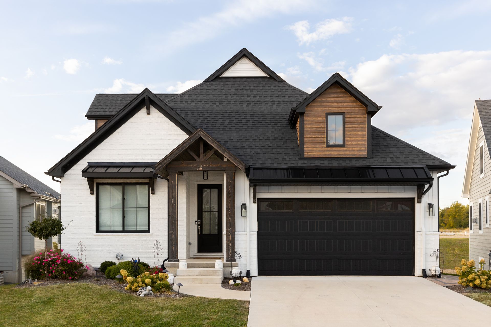 A house with a roof that has a window on it