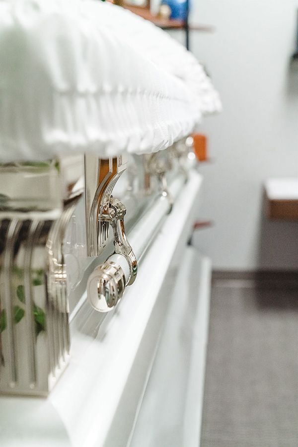 12 images of Affordable Funerals & Cremation Merchandise with various photos that include caskets, urns, cremation jewelry in Murray, UT