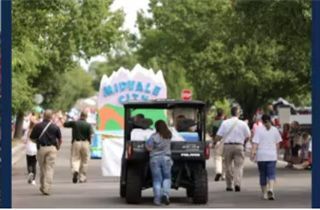 Midvale City Harvest Days picture of people in parade Midvale, UT