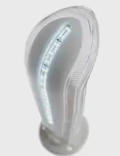 A close up of a white light bulb on a white background.