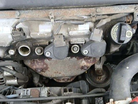 A close up of the engine of a car