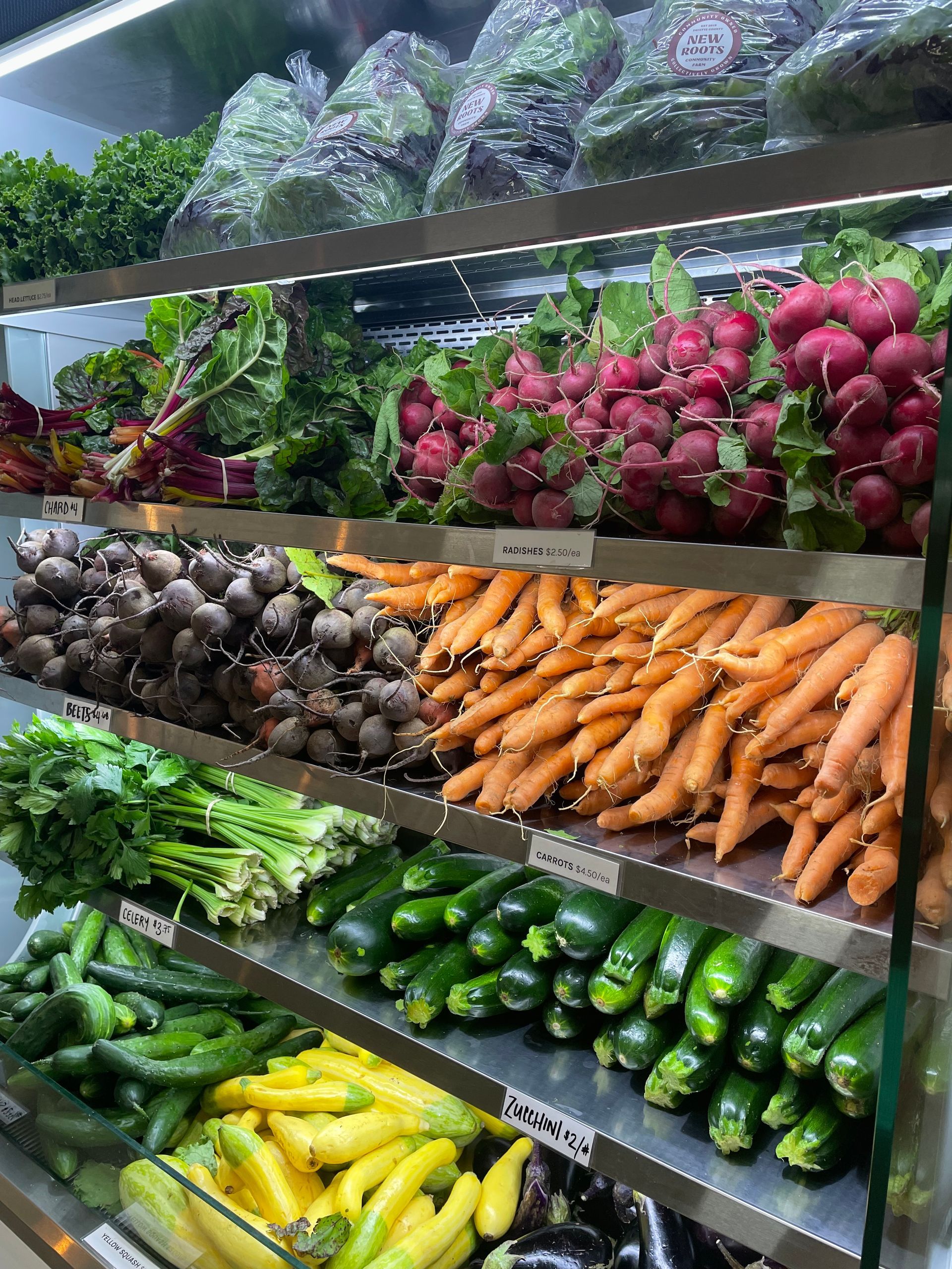 gallery view of cooler full of vegetables