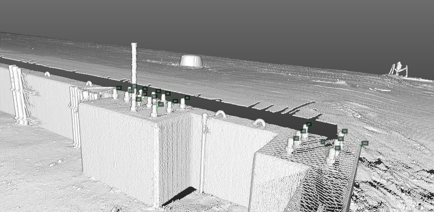 LiDAR point cloud of an anchor bolt survey, shaded in white.