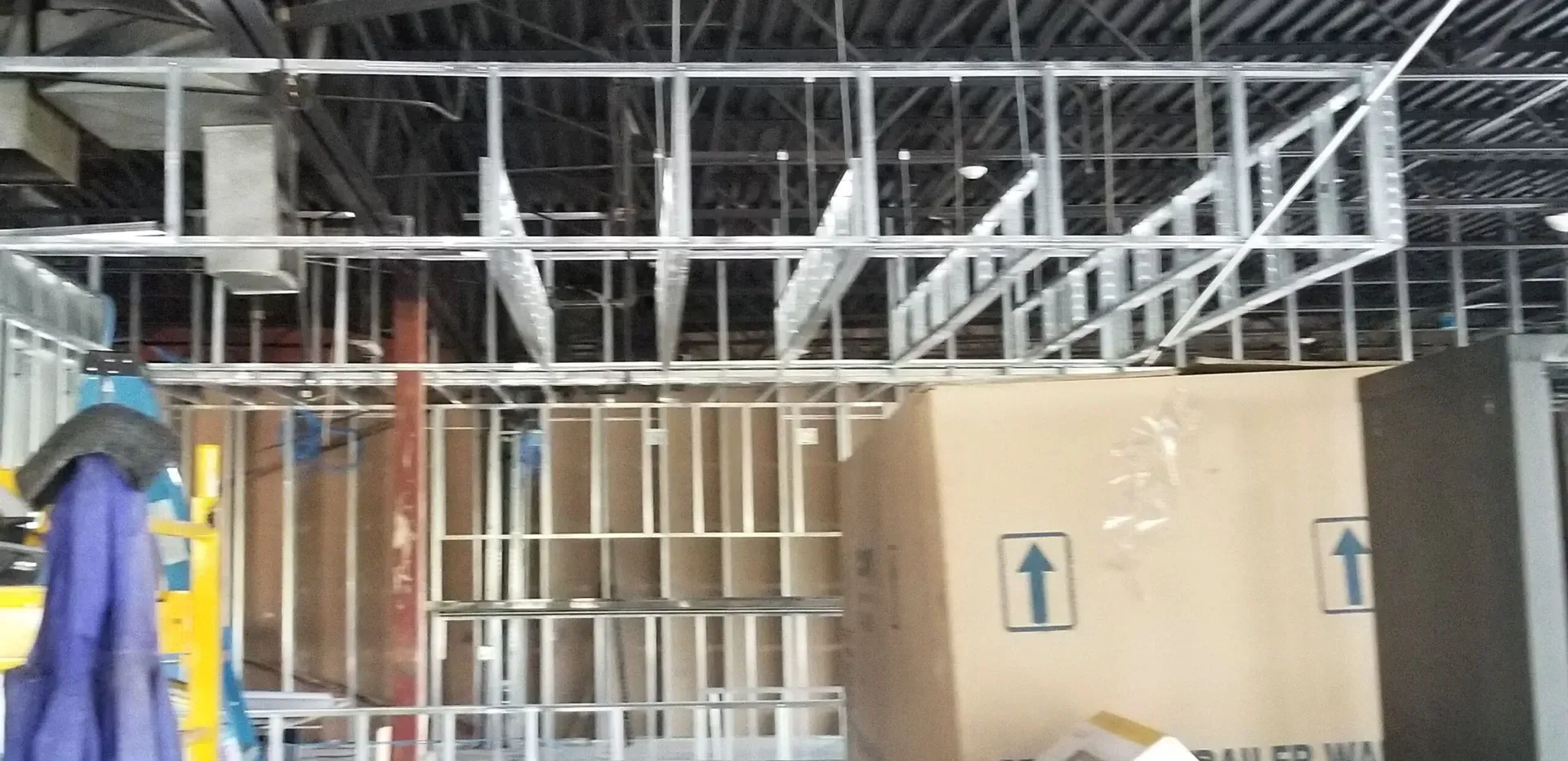 A building under construction with a ceiling that is being built