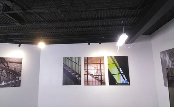 A room with a lot of pictures on the wall