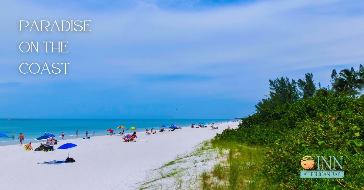 People enjoying Vanderbilt Beach in Naples, Florida. 