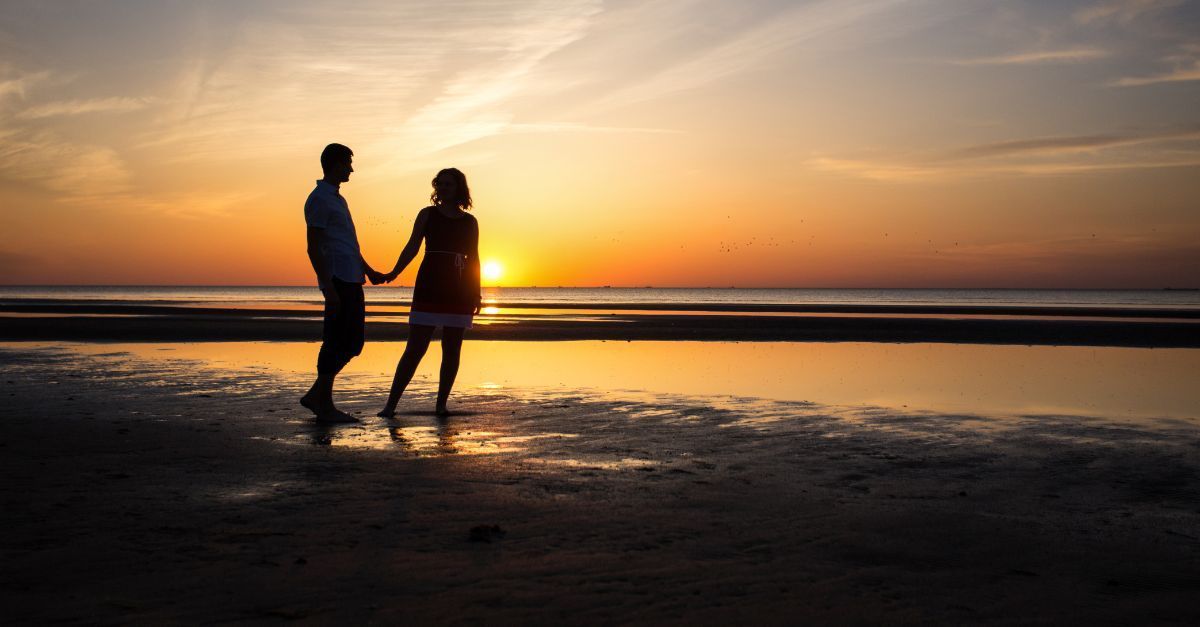 Two people enjoying a romantic winter escape in Naples