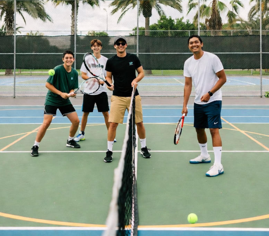Family playing PickleBall