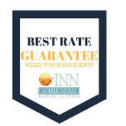 A badge that says `` best rate guarantee when you book first ''.