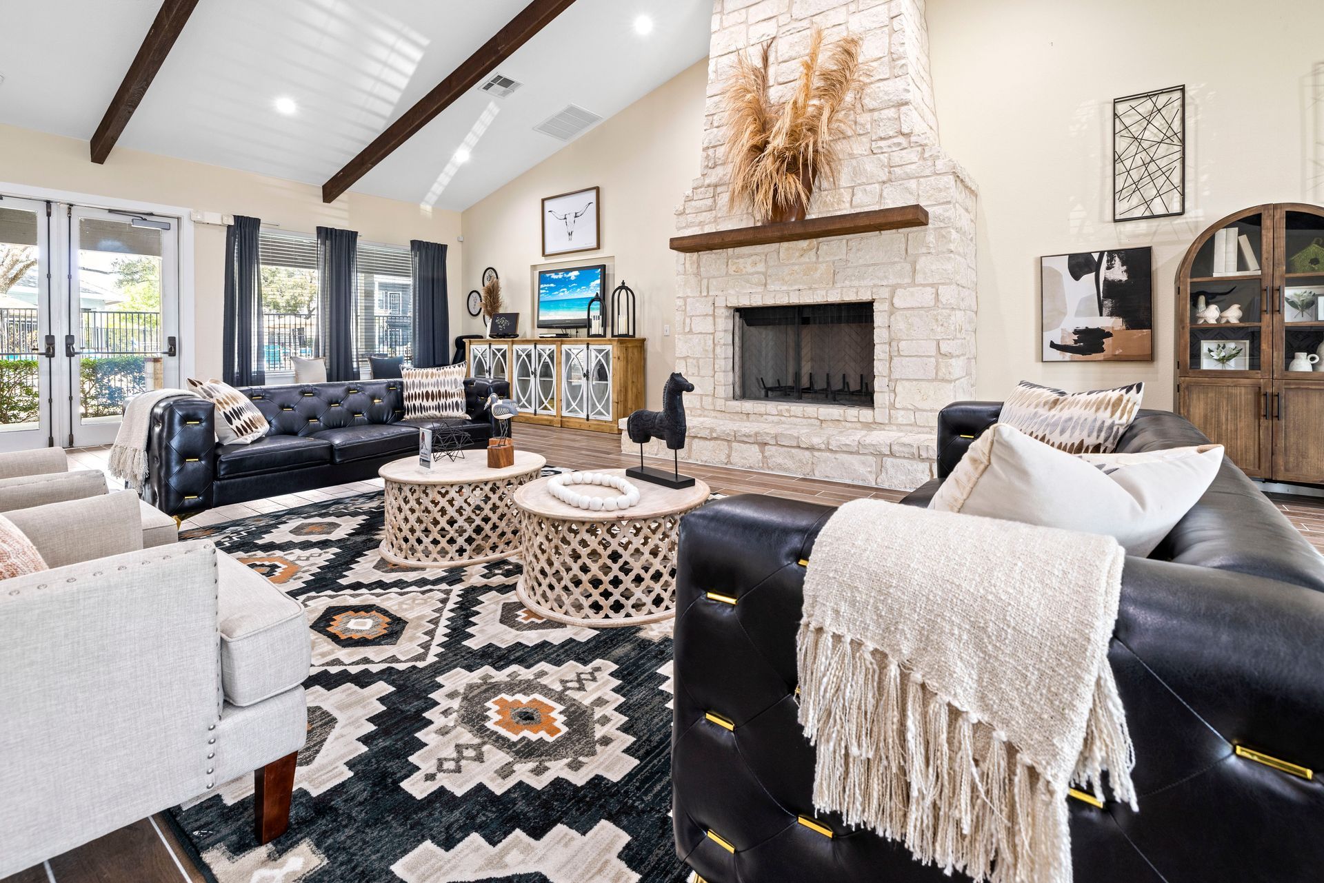 A living room filled with furniture and a fireplace.