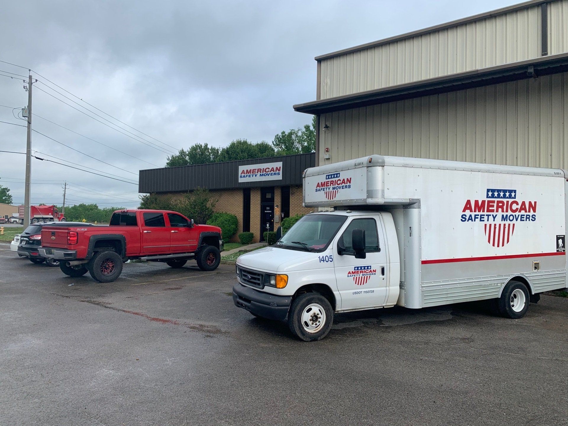 Worker Loading Truck — Huntsville, AL — American Safety Movers