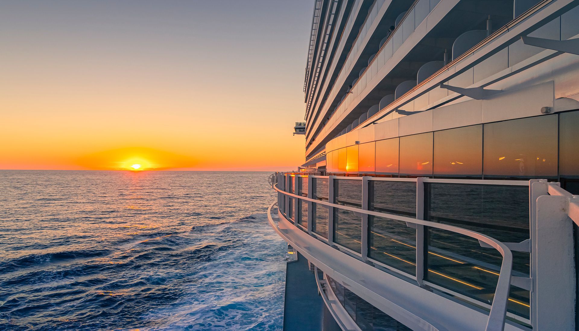 House under renovation, with paint cans and ladders. Exterior has white and brown sections.