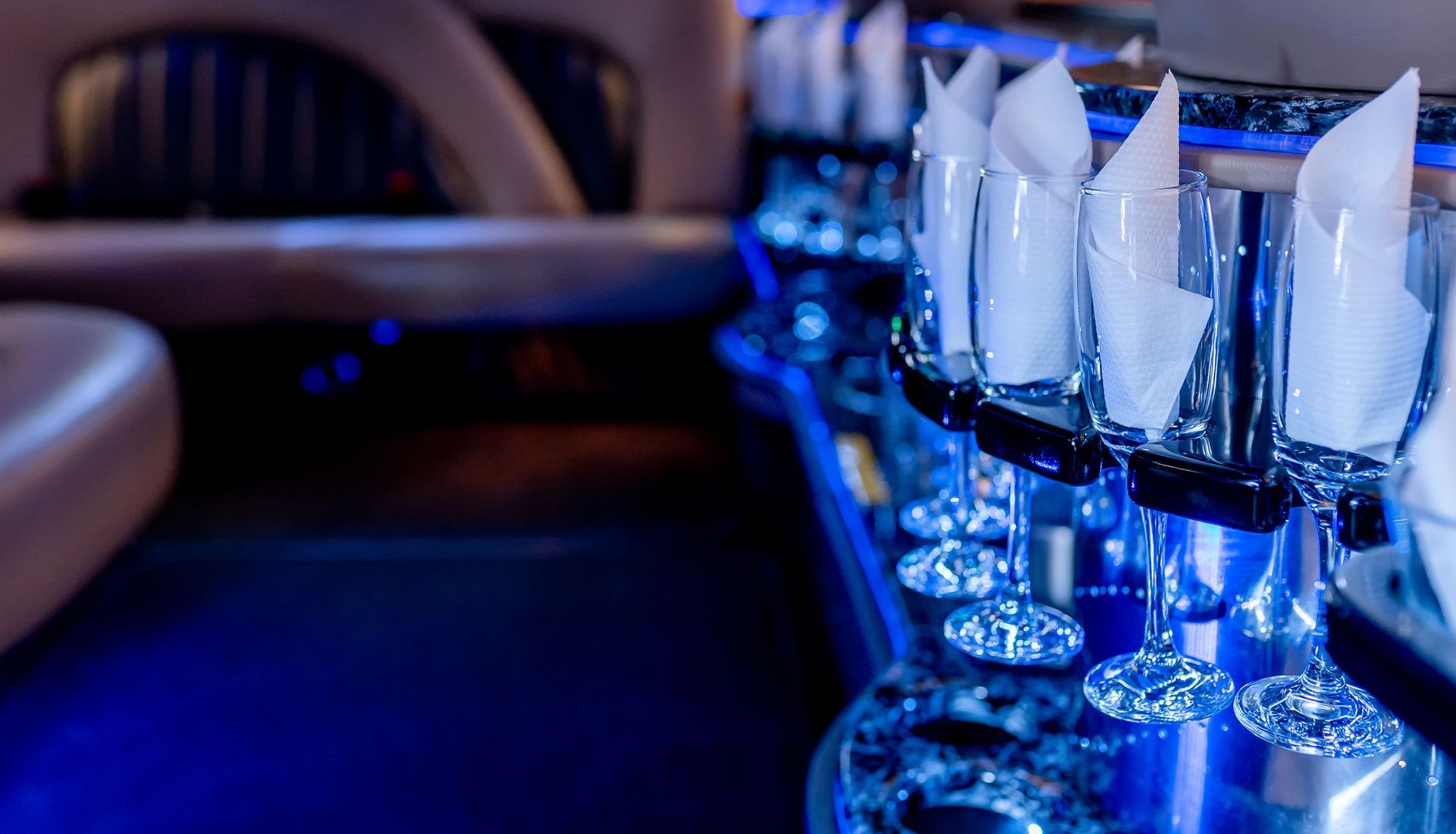 House under renovation, with paint cans and ladders. Exterior has white and brown sections.