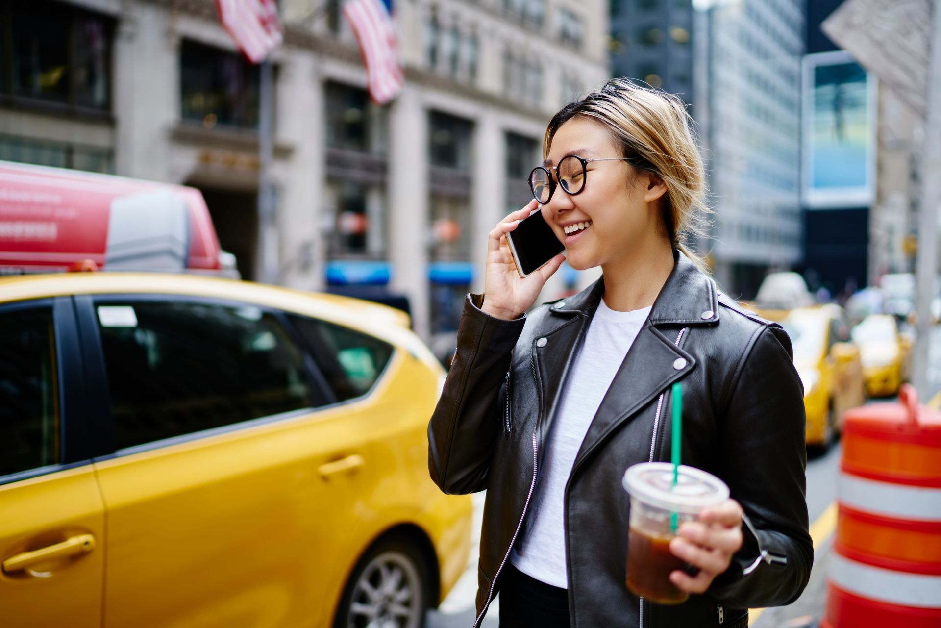 A wooden judge 's gavel is sitting on top of a black table.